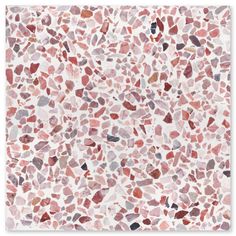 an abstract mosaic tile pattern in red and pink tones, with small rocks on the floor