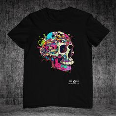 Cool Skull T-shirt Unisex Bella Canvas T-shirt.  Made from high-quality Bella Canvas fabric, this skull short sleeve shirt features a bold statement in eco-friendly ink.  With a modern, unisex fit, it's comfortable and suitable for both men and women.  Dress it up or down for any occasion and make a statement wherever you go.  Get yours today! .: 100% Airlume combed and ringspun cotton (fiber content may vary for different colors) .: Light fabric (4.2 oz/yd² (142 g/m .: Retail fit .: Tear away l Multicolor Skull Print T-shirt With Crew Neck, Multicolor Crew Neck T-shirt With Skull Print, Day Of The Dead Skull Print Crew Neck T-shirt, Cotton Graphic Print T-shirt For Day Of The Dead, Skull Art Print, Skull Graphic, Skull Shirt, Skull T Shirt, Tee Shirt Homme