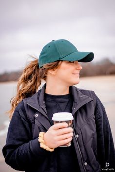 Highlights: ▪️ Patent-pending magnetic back opening provides flexibility for your hairstyle ▪️ Comfortable stretch fit design ▪️ Structured front ▪️ Strong (neodymium) magnets used to securely close the opening when not in use. long hair | curly hair | ponytail | pony hairstyle | fall vibes | coffee time | green | fall colors | beach | fall aesthetic | baseball cap | baseball hat | comfortable | hat outfit | scrunchie | low pony | low ponytail Pony Hairstyle, Long Hair Curly, Curly Hair Ponytail, Green Baseball Cap, Pony Hairstyles, Portrait Reference