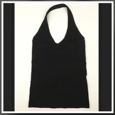 Super Stretchy Black Halter Top. Never Worn Black Stretch Halter Top With Built-in Bra, Black Fitted Racerback Halter Top, Black Stretch Seamless Halter Top, Black Seamless T-back Tank Top, Chic Stretch Seamless Halter Top, Chic Seamless Stretch Halter Top, Black Seamless Halter Neck Top, Black Fitted Halter Top With T-back, Black Fitted T-back Halter Top