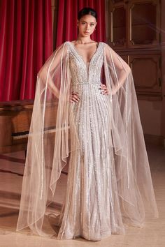 Beaded Fitted Long Cape Sleeve Gown by Ladivine CD865 Ball Gowns With Capes, Art Deco Gown, Summer Court, Art Deco Wedding Dress, Sheer Cape, Cape Sleeve Dress, Formal Prom Dresses Long, Cinderella Divine, Column Skirt