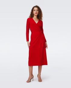 Crafted from a soft cashmere-wool blend, the Astrid midi dress has a cozy feel. This true wrap dress has long sleeves, a V-neckline, and ties at the waist. A bestseller year after year, this piece has a simple, polished look that can be dressed up or down.Yana is 5 Foot and 8 Inches and wearing a size XS. Winter Cashmere Midi Dress, Fall Evening Midi Wrap Dress, Long Sleeve Cashmere Work Dress, Long Sleeve Cashmere Dress For Work, Long Sleeve Cashmere Dresses For Work, Elegant Long Sleeve Wrap Dress For Winter, Winter Evening V-neck Midi Dress, Fall Workwear Midi Dress With Surplice Neckline, Fall Midi Dress With Surplice Neckline For Work