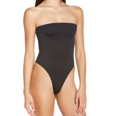 Frankies Bikinis Stella Strapless One-Piece Swimsuit In Black, Size Xs -Never Worn, Great Condition -Black -Size Xs Backless Smoothing Bodysuit For Beach, Smoothing Bodysuit For The Beach, One-piece Shapewear Swimwear With Smoothing Detail, One-piece Shapewear Swimwear, One-piece Smoothing Shapewear Swimwear, Seamless One-piece Bodysuit For Sunbathing, Sleek One-piece Stretch Swimwear, Sleek Stretch One-piece Swimwear, Sleek One-piece Bodysuit For Swimming