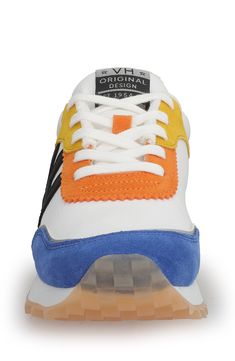 A grippy tread climbs up the back of a throwback sneaker boasting plush cushioning for enhanced shock absorption. Lace-up style Cushioned insole Leather upper/synthetic lining/rubber sole Imported Orange Running Sneakers With Rubber Waffle Outsoles, Orange Running Shoes With Rubber Waffle Outsoles For Jogging, Orange Athleisure Sneakers With Rubber Sole, Orange Rubber Sole Sneakers For Athleisure, Orange Running Sneakers With Abzorb Midsole, Sporty Orange Sneakers With Vibram Sole, Orange Synthetic Dynamic Sneakers, Orange Dynamic Synthetic Sneakers, Dynamic Orange Synthetic Sneakers