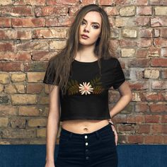 The season's trendiest garment - the crop top. This top is tight-fitting but still incredibly comfortable, and it hits just above the navel.  * 52% combed ring-spun cotton, 48% polyester * Fabric weight: 3.6 oz/yd² (122 g/m²) * 40 singles * Slim fit * Side-seamed construction * Blank product sourced from Nicaragua, the US, or Honduras This product is made especially for you as soon as you place an order, which is why it takes us a bit longer to deliver it to you. Making products on demand instead of in bulk helps reduce overproduction, so thank you for making thoughtful purchasing decisions! Fitted Casual Cropped T-shirt For Fall, Fitted Crop Top T-shirt For Fall, Fitted Cropped T-shirt Crew Neck For Fall, Fitted Crew Neck Cropped T-shirt For Fall, Fall Cotton Cropped T-shirt, Fall Cropped Cotton T-shirt, Fitted Graphic Print Cropped Shirt For Spring, Graphic Print Crop Top For Fall, Fitted Cropped Shirt With Graphic Print For Spring