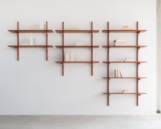 an empty room with bookshelves on the wall