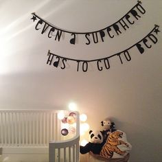 an instagramted photo of someone's bedroom with their name on the wall