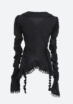 Venture into the shadows with the Goth Asymmetric Ruched Sleeve Blouse. This creation blends the enigmatic allure of goth culture with intricate ruffles, sophisticated button closures, and ethereal lace adornments. Its dramatic flare cuffs and plunging V-neck carve out a niche in any avant-garde wardrobe, perfect for those who court the night in style. Goth aesthetic Ruffled design Button fastening Lace details Flare cuffs V neck Long sleeve Cotton Gothic Tops With Lace Trim For Fall, Gothic Black Top With Lace Collar, Gothic Halloween Tops With Ruffles, Gothic Ruffled Tops For Halloween, Gothic Style Tops With Lace Collar For Party, Gothic Party Tops With Lace Collar, Gothic Party Top With Lace Collar, Halloween Party Top With Ruffles, Halloween Party Ruffle Top