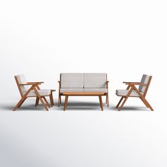 three pieces of furniture sitting on top of a white surface with one chair and the other two