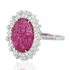 Exuding timeless beauty, this cocktail ring boasts intricate craftsmanship in 18K white gold, adorned with natural diamonds and carving rubies. Resembling a blooming flower, its delicate design evokes elegance and sophistication. A symbol of refined luxury, this ring adds a touch of grace and allure to any ensemble. This Ring is Made In 18k white gold: 4. 884 grams with diamonds: 1. 14 cts and Ruby: 3. 15cts(ING-9070)  This jewelry is made by hand featuring detailed workmanship. Be careful to avoid dropping or banging as physical impacts can result in damage to the pieces including stones falling off. To care for your or jewelry, take caution to keep away from harsh chemicals, Perfume, and Water. You may wipe with a clean polishing cloth to maintain a beautiful shine. Keep in mind that ext Diamond Cocktail Rings, Delicate Design, Ruby Ring, Cocktail Ring, Cocktail Rings, Timeless Beauty, Semiprecious Stones, Precious Stones, Floral Rings