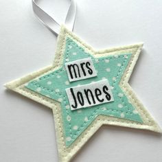 a star ornament with the words mrs jones on it