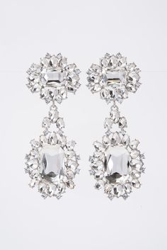 These Zara Baroque Crystal Cluster Earrings are made with premium materials for a luxurious look. The gold plated metal and intricate design of crystal gemstones come together for a sophisticated and timeless style. With a secure post-back closure, these earrings make an elegant statement in any occasion. Size Height: 4.15 inWidth: 5.5 in Quality Made with quality metals for ensured endurance. ImportedEY12241 Luxury Silver Statement Cluster Earrings, Crystal Cluster Earrings, Pearl Shop, Holiday Essentials, Pearl Set, Cluster Earrings, Crystal Cluster, Come Together, The Gold