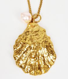 The Large Curly Oyster Necklace is a handcrafted pendant in the shape of a an oyster shell, exactly like something you'd find on sunny shores. It can be worn alone or layered for the perfect beach or summer look. QUALITY Handmade in New York. Choose from 14kt yellow gold over brass, sterling silver or edgy gunmetal. LET'S GET PERSONAL Kick up the notch on your looks! With your simple and elegant look, you can add one of our handmade bags and personalize with your necklace. We sell everything sep Oyster Jewelry, Oyster Necklace, Bling Things, Necklace With Pearl, Sell Everything, Shell Jewelry, Oyster Shell, Shell Necklaces, Summer Look