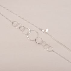 "This delicate 90th birthday necklace features nine lovely interlocking circles, hanging from the delicate 925 sterling silver chain. Each sterling silver necklace in this collection comes with a memorable quote printed on a wish card. It makes a beautiful and thoughtful 90th birthday gift for women. The message shown reads: Header: Happy 90th Birthday! Body: One Ring for One Fabulous Decade Here's to a happy 90 years, and cheers to 90 and more ✿Materials 925 Sterling Silver ✿ Product - Size Pen Grandma 90th Birthday, 90th Birthday Ideas, 90 Birthday, Custom Gift Ideas, Happy 90th Birthday, 90th Birthday Gifts, Birthday Necklace, Birthday Gift For Women, 90th Birthday