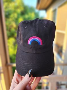 Adult sized unstructured dad hat (buckleback adjustable closure 21"-25" circumference) (25 assorted colors) with embroidered rainbow on the front . rainbow measures at 2" wide and 1" tall . . If you would want anything changed, please make note of it in the order, I do most of these made to order so don't be afraid to customize it! :) All orders are made in the order they are received but if you need your order earlier than what the shipping and receiving dates are please DM me! I can usually move some stuff around :). . Please make sure you address is 100% correct when ordering, if USPS doesn't receive a verified address I cannot purchase shipping labels and will need to cancel your order if I don't receive a message back as to how to update it.. . . express shipping with be shipped withi Casual Adjustable Rainbow Hat, Casual Rainbow Hat, One Size Fits Most, Casual Rainbow Hat One Size, Casual Rainbow Hat One Size Fits Most, Embroidered Rainbow, Bi Flag, Rainbow Flag, Don't Be Afraid, Pride Flag