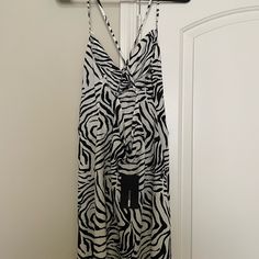 New Satin Mini Dress With Tags Attached, Criss Cross Straps On Back. Size Large. Black Zebra Print V-neck Dress, Sleeveless Zebra Print Vacation Dress, Sleeveless Zebra Print Dress For Vacation, Spring Beach Dress With Zebra Print, Zebra Print Beach Dress For Spring, Beach Dress With Zebra Print, Beach Dresses With Zebra Print, Chic V-neck Dress With Zebra Print, V-neck Zebra Print Dresses For Vacation