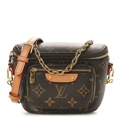 This is an authentic LOUIS VUITTON Monogram Mini Bumbag. This stylish belt bag is created out of a traditional Louis Vuitton monogram on coated canvas. The bag features a front zipper pocket, an optional vachetta cowhide adjustable leather shoulder strap, and a removable short gold chain short strap. The main zipper opens to a brown microfiber interior. Lui Viton, Louis Vuitton Belt Bag, Louis Vuttion, Authentic Louis Vuitton, Belt Bag, Front Zipper, Louis Vuitton Monogram, Gold Chain, Gold Chains