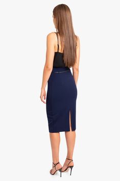 The classic pencil skirt made of our finely woven, stretch gabardine. Style features detailed yoke with a 3/8" genuine leather belt that sits at your natural waist. Skirt has center back invisible zipper, with hook and eye closure. Falls 29" from natural waist. Self: 62% Polyamide, 32% Viscose, 6% Elastane. Lining: 95% Polyester, 5% Elastane. Dry Clean Only. Made in USA of Imported Materials. 29 inches From Natural Waist Genuine Leather Belt Center Back Hidden Zipper Fully Lined Tailored Pencil