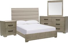 a bed, dresser and mirror are shown in this image with white sheets on it