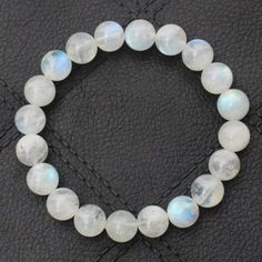 "Material- white rainbow Gemstone Color- White bracelet length- 7-7.5inch beads size- 4,6,8,mm Shape- Round About this item The bracelet shown is 7-7.5\" size which fits an average wrist but if you have a different wrist size you can message us we will custom make your order This is a stretch fit bracelet, allowing for easy on-off fitment over the hand Sell Unit 1 bracelet, beads size 4,6,8, mm fully stretchable bracelet Direct from Jaipur-India, Best Price, Hand select, Nice Quality Size, Weight & Colour are approximate and may slightly vary Stone: Natural moonstone (no dyed, no color enhanced, Natural crystal/gemstone Moonstone is a stone of inner growth and strength; It is believed to help soothe emotional instability and stress, and stabilize the emotions, providing calmness; Moonstone White Polished Beads Bracelets As Gift, White Natural Stone Round Bracelets, Handmade White Crystal Bracelet For Gift, Handmade White Crystal Bracelet Gift, White Natural Stone Bracelets, Elegant White Moonstone Beaded Bracelets, Adjustable Moonstone Bracelet With Gemstone Beads, Adjustable Moonstone Gemstone Bead Bracelet, White Gemstone Beaded Bracelets For Meditation