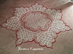 a white and red design on the ground