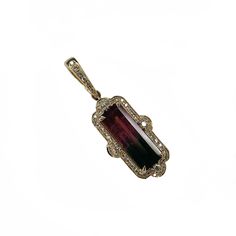 14K Yellow Gold 1 Rectangular Watermelon Tourmaline = 3.92ctw. 46 Round Diamonds = 0.35ctw. The pendant measures 34mm tall and 12mm wide. The chain is not included. Elegant Tourmaline Pendant Jewelry, Luxury Tourmaline Pendant Jewelry, Elegant Oblong Gemstone Jewelry, Fine Jewelry Tourmaline Pendant, Elegant Tourmaline Jewelry With Accent Stones, Rectangular Tourmaline Gemstone Jewelry, Rectangular Tourmaline Jewelry For Gifts, Rectangular Tourmaline Jewelry Gift, Tourmaline Gemstone Pendant Jewelry