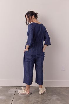 About Prodcut Introducing our Cotton Linen Blend Denim Button-Down Jumpsuit - a versatile and stylish wardrobe staple for any season. Crafted from cotton and linen, this jumpsuit offers the perfect balance of comfort and durability.Designed with a classic button-down front, this jumpsuit exudes a timeless charm while providing a flattering and adjustable fit. Experience the joy of looking effortlessly fashionable while feeling comfortable and confident in this versatile piece. Make a statement w Spring Linen Jumpsuits And Rompers For Work, Spring Indigo Denim Jumpsuit With Pockets, Dark Wash Cotton Overalls, Relaxed Fit Dark Wash Jumpsuits And Rompers, Indigo Cotton Denim Jumpsuit Overall, Indigo Cotton Denim Jumpsuit, Casual Linen Jumpsuits And Rompers For Work, Spring Dark Wash Overalls For Work, Spring Workwear Dark Wash Overalls