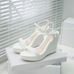 Product Description: - Name & Type: Super cute flower-embellished wedge sandals for brides. - Heel height: 11 cm. - Material: high-quality leather. - High-quality elastic TPR sole material, noise reduction armor. Especially good adhesion, non-slip. - Decoration: flowers. - Color: White. - Occasion: Wedding, party, office, going out... * Warranty and size exchange policy: All She Bride products have a warranty policy. Flexible size exchange policy. After receiving the product, if you do not fit a Wedge Sandals Wedding, Wedding Sandals For Bride, Shoes For Brides, Slip Decoration, Wedding Wedges, Wedge Wedding Shoes, White Wedge Sandals, Princess Halloween Costume, Designer Wedding Shoes