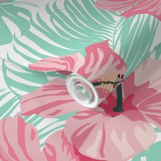 a pink and green floral wallpaper with a white vase on the top of it