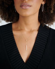 Our 18k adjustable diamond lariat necklace features 0.35ct carat of delicately set diamonds. Wear this piece long or shorten up to a choker length. We love this piece for everyday layering magic! 18k Yellow Gold, White Gold, Rose Gold 0.35ct total weight Adjustable 22" longest length, 14" shortest length The diamond bar drop is 1.5" from the diamond bezel Full cut, clear, round brilliant cut diamonds Benefits of Solid 18k Gold Jewelry Most loved for its durability and longevity Can be worn daily Delicate Diamond Lariat Necklace With Adjustable Chain, Delicate Lariat Diamond Necklace With Adjustable Chain, Elegant Bar Necklace With Adjustable Chain For Everyday, Elegant Everyday Bar Necklace With Adjustable Chain, Dainty Diamond Lariat Necklace, Dainty Lariat Diamond Necklace, Formal Delicate Chain Bar Necklace, Minimalist Gold Diamond Lariat Necklace, Minimalist Long Drop Diamond Jewelry