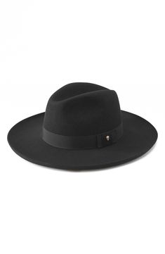 A flat, slightly upturned brim enhances the chic look of this merino wool–felt fedora that complements both casual and more polished looks. Interior size adjuster Merino wool Dry clean Made in Spain Helen Kaminski, Wool Fedora, Felt Fedora, Chic Look, The Chic, Polished Look, Wool Felt, Fedora, Merino Wool