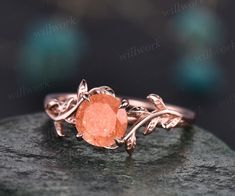 - Metal: Solid gold(10K/14K/18K white/yellow/rose gold),925 sterling silver,platinum available- Main Stone: 7mm round cut natural sunstone- Can be personalized: Yes Sunstone Wedding Ring, Orange Wedding Rings, Alt Rings, Orange Engagement Ring, Orange Rings, Egagement Rings, Sunstone Engagement Ring, Sunstone Ring, Rose Gold Art