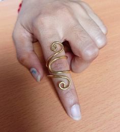 "Trigger Finger Rings, Arthritis Ring, Mallet Finger Rings, EDS Finger Splint Rings, Adjustable Arthritis Rings, Brass Rings, Gifts For Her Size:- All Size Available In Variation Metal:- Brass 👇 If you have any question about size, then definitely go through it 👇 If you're knuckle is swollen, we recommend you Please tell me above and below size of your knuckle. Send me the photo of the finger in which you want to wear this ring. Write the above and below size of your knuckle in the Personalisa Spiritual Metal Toe Rings, Artistic Open Ring In Metal, Artistic Metal Rings With Unique Design, Artistic Metal Jewelry For Weddings, Artistic Metal Jewelry For Wedding, Artistic Metal Open Ring, Adjustable Metal Toe Rings As Gift, Spiral Ring As A Gift, Adjustable Metal Toe Rings Ideal For Gifts