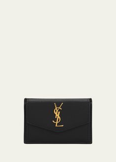 "Find SAINT LAURENT Ysl Monogram Flap Card Case In Grained Leather on Editorialist. Saint Laurent pebbled leather wallet. Envelope flap top with snap closure. Signature YSL hardware at front. Golden hardware Card slots at back. Interior, coin pouch. 2.7\"H x 4.1\"W x 0.2\"D. Made in Italy." Ysl Small Envelope, Ysl Card Case, Ysl Passport Case, Ysl Card Holder, Ysl Envelope Chain Wallet, Ysl Wallet, Envelope Wallet, Leather Card Case, Dark Beige