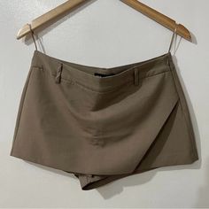 Zara Asymmetrical Tan/Taup Hight Waisted Skort 2 Pockets Brand New With Tag Waist 35” Beige Asymmetrical Bottoms For Summer, Beige Asymmetrical Bottoms For Work, Asymmetrical Beige Bottoms For Summer, Asymmetrical Beige Bottoms For Work, Summer Workwear Bottoms With Asymmetrical Hem, Asymmetrical Beige Bottoms For Spring, Fitted Asymmetrical Beige Bottoms, Spring Workwear Skort With Asymmetrical Hem, Asymmetrical Skort For Summer Workwear