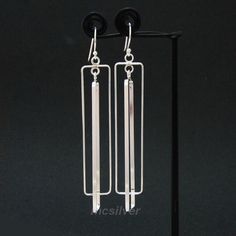 ❤️925 Sterling Silver Square Earrings Long bar Earring Geometric Dangle Earring Rectangular Silver Earring Rectangle Silver Earrings Modern Jewelry 🎁Elegant box gift 🎁Free Shipping ❤️Detail: ✅Condition: New, Shiny ✅Material: .925 Sterling Silver ✅Dimension: 50 mm. (Excluding Hook Length), 10 mm. Width, Square Wire ✅Approx. Weight: 5.5 Grams ✅Quantity: 1 Pair ✅Silver Contain: 92.5% (925 Hallmark) ✅Origin: MCSILVER JEWELRY THAILAND (E247) 1 cm = 10 mm. 1 inch = 2.54 cm. 1 inch = 25.4 mm 💍MADE T Minimalist Oblong Earrings For Formal Occasions, Formal Minimalist Oblong Earrings, Elegant Rectangular Sterling Silver Earrings, Classic Silver Linear Earrings For Everyday, Modern Oblong Single Earring Jewelry, Modern Silver Earrings With Rectangular Pendant, Silver Jewelry With Rectangular Pendant And Matching Earrings, Elegant Everyday Earrings With Rectangular Pendant, Modern Silver Rectangular Pendant Earrings