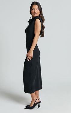 Get ready to turn heads in the stunning Carmilette Midi Dress. This black slip dress is perfect for any occasion, whether you're heading to work or hitting the town with your squad. The cowl neck adds a touch of elegance and sophistication, while the ruched jersey fabric hugs your curves in all the right places. With its short sleeves and midi length, this dress strikes the perfect balance between sexy and sophisticated. Made from high-quality nylon jersey material, it's comfortable enough for a Chic Black Maxi Dress With Cowl Back, Fitted Black Maxi Dress With Cowl Back, Chic Formal Midi Dress With Cowl Neck, Fitted Cowl Neck Midi Dress For Formal Occasions, Fitted Cowl Neck Maxi Dress For Date Night, Black Cowl Back Dress For Formal Occasions, Black Formal Dress With Cowl Back, Formal Black Dress With Cowl Back, Fitted Cowl Neck Midi Dress For Evening