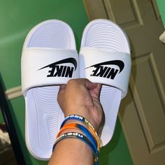 White Nike Slides, Never Worn, 10/10 Condition, No Longer Want White Flat Slides For Leisure, White Sneakers For Summer Leisure, White Sneakers For Leisure Summer Activities, White Sneakers For Leisure In Summer, White Slides For Leisure In Spring, White Slides For Spring Leisure, Comfortable White Nike Slides, White Cushioned Sneakers For Leisure, White Leisure Sneakers With Cushioned Footbed