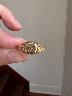 Selling an assortment of antique jewelry that I have hunted for and gathered from all over the world to offer you.  Some examples seen in the group photo.   ABOUT: Antique signet ring in rich 18k gold with embossed designs -  lovely, detailed gold work. This old beauty is from the early 1800s Georgian era. It has ornate initials engraved but I'm not exactly sure which, maybe C S ? Makes a striking and unique stacker with a great antique appearance. This French antique piece from the Georgian era is one I purchased in Paris. French hallmarks for 18k. Antique box is not included.  Listing is for the one ring with the others in the stack shown for color comparison and scale. Really nice condition, still sturdy, some surface wear but beautiful antique patina in the recesses to make the design Signet Ring Initials, The Ring Face, Georgian Era, Antique Boxes, Gold Work, Group Photo, French Antique, Romantic Gift, One Ring