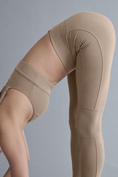 A subtle nod to the ’80s, these leggings have coolly contrasting ribbed panels and bikini bottom seaming. We love the high-rise, full-length fit and the stretchy elastic waistband with a tonal Alo logo. And they’re done in Alosoft—our coziest fabric with a buttery feel and a brushed finish. Complete the look with the matching Alosoft Head Start Bra. Alo Yoga Fitted Functional Bottoms, Alo Yoga Functional Fitted Bottoms, Alo Yoga High Stretch Athleisure Bottoms, Sporty Alo Yoga Bottoms For Pilates, Sporty High Stretch Alo Yoga Bottoms, Sporty Ribbed Yoga Bottoms, Sporty Compressive High-cut Leg Bottoms, Alo Yoga Tight Bottoms For Pilates, Alo Yoga Stretch Bottoms For Yoga