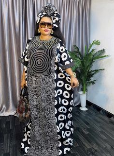 100% cotton. Made with African Ankara fabric. Perfectly stoned for a Queen and more! One size fits all. Ready made dresses Lenght of this dress is 62 inches Luxurious great quality. NOTE: The photos are the exact dress and not a replica. What you see is what you get exactly. All ready made. We ship immediately. Adire Boubou Styles For Women, Adire Kaftan Styles, Adire Fabric, African Maxi Dress Ankara, Gown Dress Party Wear, Party Dress Inspiration, Boubou Styles For Women, Kaftan Styles, Bubu Gown Styles