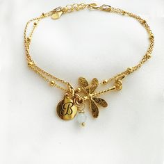 "The subtle Dainty layering dragonfly  bracelet is truly beautiful-  intricately detailed  so sweet jewelry. May be worn on its own, or styled with the other. This is \"double face\" charm-same for both side , no worry on the pendant twist ! Matching jewelry available :)  https://www.etsy.com/shop/AnemonAtelier?ref=seller-platform-mcnav&search_query=dragonfly ♡ DETAILS  Pendant : 0.66\" x 0.78\" (17 mm x 2 cm) Material:  24 k gold plated over 925 sterling silver  Lenght: 6.29\" - 16 cm plus exte Dragonfly Bracelet, Jewelry Nature, Sweet Jewelry, Dragonfly Jewelry, Jewelry Simple, Gold Jewelry Simple, Matching Jewelry, Double Chain, Bracelet Gold