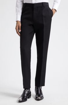 Tailored elegance pervades Italian-crafted pants fashioned from smooth wool with a mid rise and cleanly pressed creases. 34" inseam; 14 1/2" leg opening; 11 1/2" front rise; 14 1/2" back rise (size 48 EU) Zip fly with hook-and-bar closure Side-seam pockets; back button-welt pockets 100% wool Dry clean Made in Italy Designer Clothing Luxury Straight Leg Dress Pants For Semi-formal Occasions, Luxury Tapered Leg Dress Pants For Semi-formal Occasions, Tailored Wool Suits With Tapered Leg, Formal Slim Fit Suiting Fabric Pants, Formal Slim Fit Pants In Suiting Fabric, Formal Flat Front Pants With Belt Loops, Black Fitted Wool Bottoms, Semi-formal Suit With Tapered Leg, Fitted Black Wool Bottoms