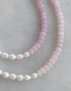 All things sweet & pearl! Choose from two gorgeous hues of pink and purple jade beads, split with real, freshwater pearls. Adjustable 15-17in. Finished off with 14K gold filled materials. Nickel and lead free. Pink Pearl Necklace With Natural Round Beads, Pink Pearl Necklace With Round Beads, Pink Pearl Jewelry With Natural Stones, Pink Pearl Necklace With Round Natural Stones, Pink Beaded Necklaces With Pearl Charm, Pink Dainty Pearl Chain Necklace, Dainty Pink Pearl Beaded Necklaces, Dainty Pink Pearl Chain Necklace, Pink Pearl Drop Beaded Necklaces With Round Beads