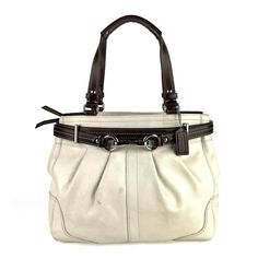 Coach F12476 White Leather Tote Bag  Leather Double shoulder straps W 12.5", H 10", Depth 3.5" (width & depth is measured across bottom of the handbag) Shoulder strap drop: 6.5”  Interior Details:  Blue fabric lining 1 Back zip pocket, 2 front slip pockets Props such as shoe trees are not included. Please see all pictures in detail as they are considered part of the description. Shipped with USPS Priority Mail. 100% Satisfaction guarantee if you are not happy with yo Classic Satchel With Silver-tone Hardware For Errands, Vintage Satchel With Silver-tone Hardware For Everyday Use, Brown Trim, Body Picture, Shoe Tree, Tote Bag Leather, Shoulder Handbag, Bag Shoulder, Leather Tote Bag