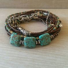 Boho Multi Strand Leather Wrap Bracelet Turquoise by DesignsbyNoa Turquoise Hand-wrapped Hippie Beaded Bracelets, Adjustable Turquoise Wrap Bracelet For Festival, Adjustable Turquoise Bohemian Wrap Bracelet, Adjustable Bohemian Turquoise Wrap Bracelet, Bohemian Turquoise Beaded Bracelets, Turquoise Bohemian Wrap Bracelet For Beach, Rustic Adjustable Turquoise Beaded Bracelets, Bohemian Turquoise Braided Bracelets For Beach, Turquoise Bohemian Braided Bracelets For Beach