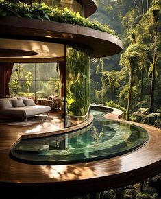 a house in the middle of a forest with a swimming pool and lounge chairs around it