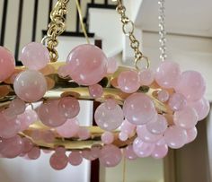 a pink chandelier hanging from the ceiling