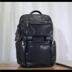 Brand New Tumi Leather Backpack. Original Price Is $750+Tax.- It’s Too Small For Me And I Can’t Return High-end Travel Backpack Shoulder Bag, High-end Everyday Backpack Shoulder Bag, High-end Rectangular Backpack For Daily Use, High-end Backpack Style Shoulder Bag, High-end Everyday Shoulder Backpack, Elegant Large Capacity Backpack For On-the-go, High-end Black Backpack Shoulder Bag, Designer Satchel Backpack With Large Capacity, Designer Large Capacity Satchel Backpack