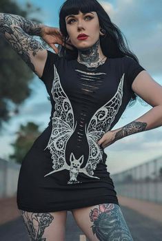 VAMPIRE Lace Wings SS Mini Dress Vampire Lace wings original hand drawn graphic tee printed on a comfy womens fitted tshirt dress made of 95% cotton and 5% spandex for an easy fit with Sizing: Fit Guide: Model 33" bust wearing Small Small: 33-34" bust 26-27" waist Medium: 35-36" bust 28-31" waist Large: 37-39" bust 32-33" waist XL: 40-41" bust 34-35" waist 2X: 42-44" bust 36-37" waist sku: Sku: VP10 Demi Loon Alternative Gothic Clothing CAT LADY DRESS,WITCH DRESS,BLACK MAGIC DRESS,PENTAGRAM DRES Fitted Fairy Grunge T-shirt For Spring, Fairy Grunge Fitted T-shirt For Spring, Spring Fairy Grunge Fitted T-shirt, Fitted Fairy Grunge Tops For Halloween, Fairy Grunge Fitted Short Sleeve T-shirt, Fitted Crew Neck Fairy Grunge T-shirt, Fitted Emo T-shirt For Summer, Short Sleeve Halloween Dress, Stretch Dresses With Graphic Print And Short Sleeves